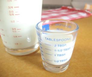 My kitchen shop also sold small shot glasses that had tablespoon and ounce measurements as well. A pour spout would make these a lot easier to use.